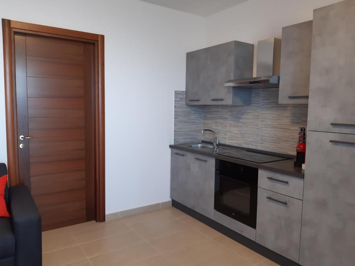 Casa Vacanze Da Lory Porto Torres Bagian luar foto
